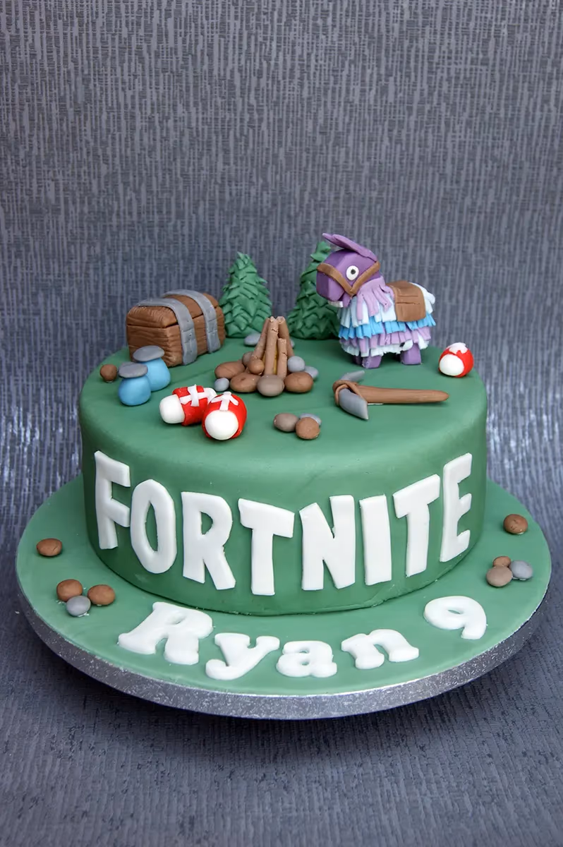Fortnite birthday cake with green llama and treasure chest for Ryan's 9th birthday