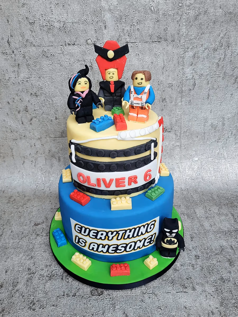 Two-tier Lego Movie themed 6th birthday cake